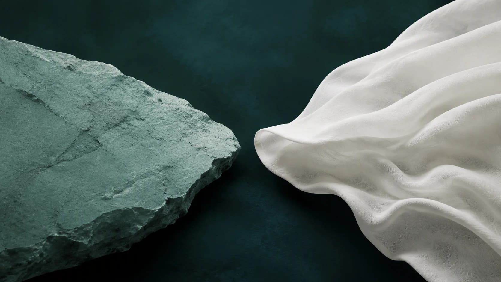 A textured solid teal form and a soft flowing off-white form meet cleanly across a deep-green field.